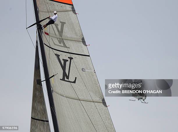 Mark Mendelblatt of Italian team Mascalzone Latino looks for wind during the Finals of the Louis Vuitton sailing trophy in Auckland on March 21,...
