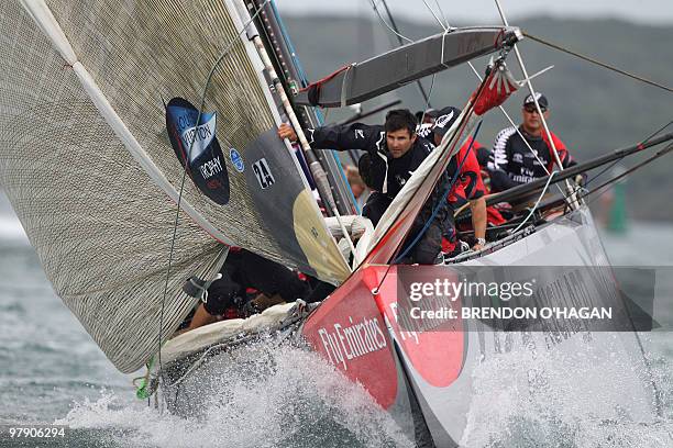 Team New Zealand prepares to round the mark during the Finals of the Louis Vuitton sailing trophy in Auckland on March 21, 2010. Emirates Team New...