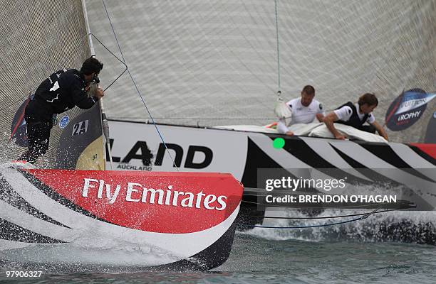 Team New Zealand and Italian team Mascalzone Latino compete during the Finals of the Louis Vuitton sailing trophy in Auckland on March 21, 2010....