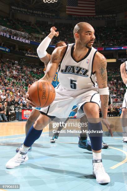 Carlos Boozer of the Utah Jazz looks to pass the ball during the game against the New Orleans Hornets at EnergySolutions Arena on March 20, 2010 in...