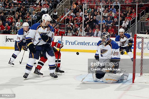 Ty Conklin and Barret Jackman of the St. Louis Blues defend the net against the New Jersey Devils at the Prudential Center on March 20, 2010 in...