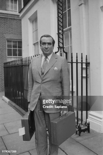 British Labour Party politician Denis Healey , Chancellor of the Exchequer, leaving 10 Downing Street, London, UK, 18th March 1974.