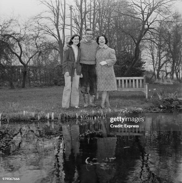 British Labour Party politician Denis Healey , Chancellor of the Exchequer, at home with his wife Edna and their daughter, UK, 25th March 1974.