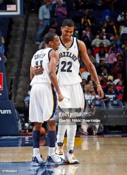 Mike Conley and Rudy Gay of the Memphis Grizzlies celebrate during a game against the Golden State Warriors on March 20, 2010 at FedExForum in...