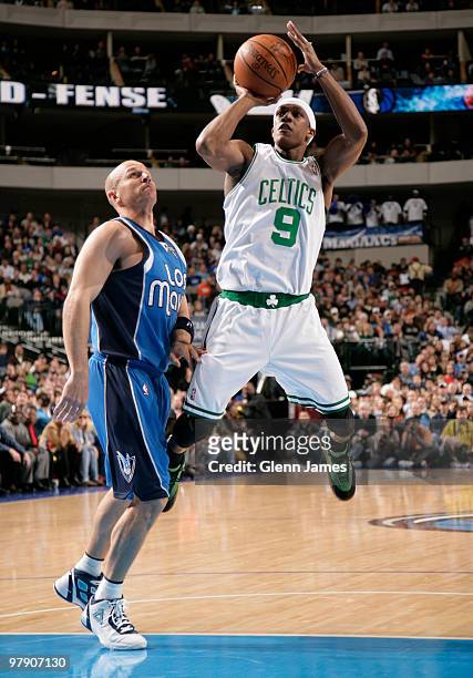Rajon Rondo of the Boston Celtics shoots a jumper against Jason Kidd of the Dallas Mavericks during a game at the American Airlines Center on March...