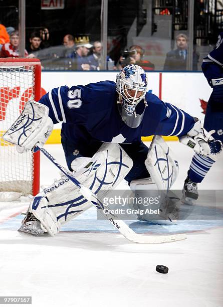 Jonas Gustavsson of the Toronto Maple Leafs makes a poke save during game action against the Montreal Canadiens March 20, 2010 at the Air Canada...