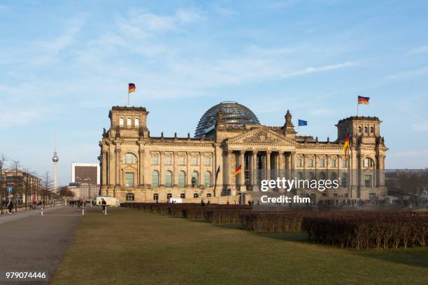 reichstag building and television tower (german parliament building) - berlin, germany - architrave stock pictures, royalty-free photos & images