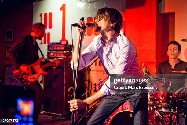 Mat Osman, Brett Anderson and Simon Gilbert of Suede perform on stage at The 100 Club on March 20, 2010 in London, England.