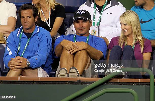 Francisco Roig, Fred Couples and guest watch Rafael Nadal and Marc Lopez of Spain play Daniel Nestor of Canada and Nenad Zimonjic of Serbia during...