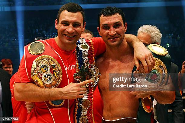 Wladimir Klitschko of Ukraine celebrates with his brother Vitali Klitschko after winning his WBO Heavyweight World Championship fight against Eddie...