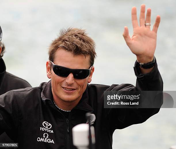 Emirates Team New Zealand Skipper Dean Barker waves to supporters following their teams win over Mascalzone Latino Audi Team from Italy to win the...