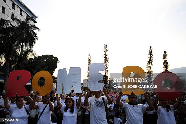 Catholic faithfuls in a procession to conmemorate the 30 aniversary of the murder of Archbishop Oscar Arnulfo Romero in San Salvador, El Salvador on...