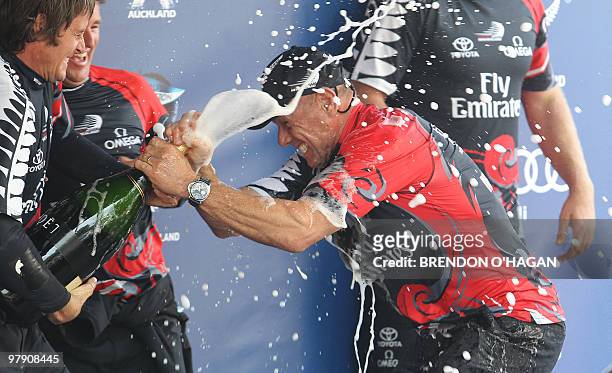 Team New Zealand's Grant Dalton celebrates following the finals of the Louis Vuitton sailing trophy in Auckland on March 21, 2010. Emirates Team New...