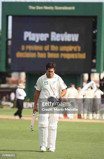 Ross Taylor of New Zealand walks from the field after being caught for LBW during day three of the First Test match between New Zealand and Australia...