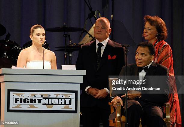 Racecar driver Danica Patrick, CEO and founder of GoDaddy.com Bob Parsons, Muhammad Ali, and Lonnie Ali speak onstage during Celebrity Fight Night...