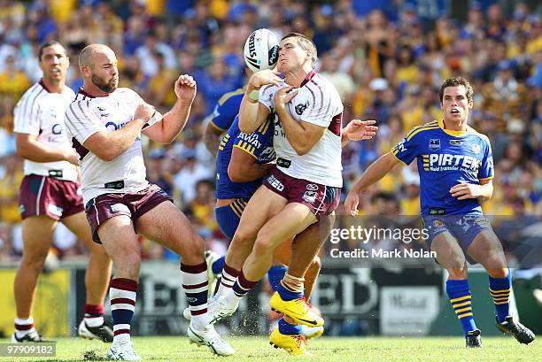 Ben Farrar of the Sea Eagles loses the ball in a tackle by Jarryd Hayne of the Eels during the round two NRL match between the Parramatta Eels and...