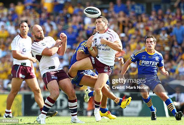 Ben Farrar of the Sea Eagles loses the ball in a tackle by Jarryd Hayne of the Eels during the round two NRL match between the Parramatta Eels and...