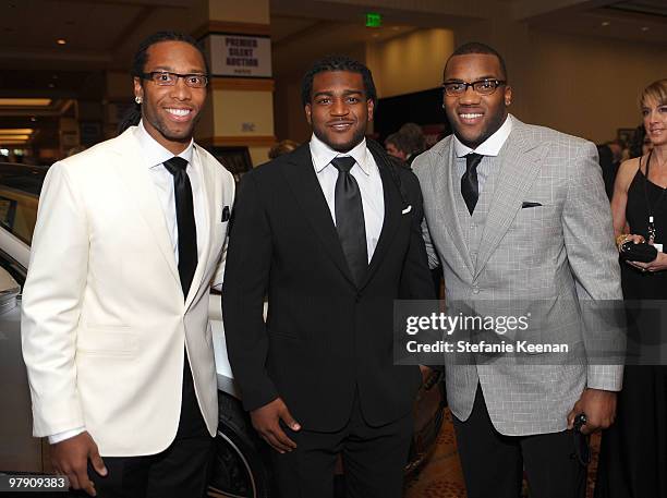 Players Larry Fitzgerald, Tim Hightower, and Beanie Wells attend Celebrity Fight Night XVI on March 20, 2010 at the JW Marriott Desert Ridge in...