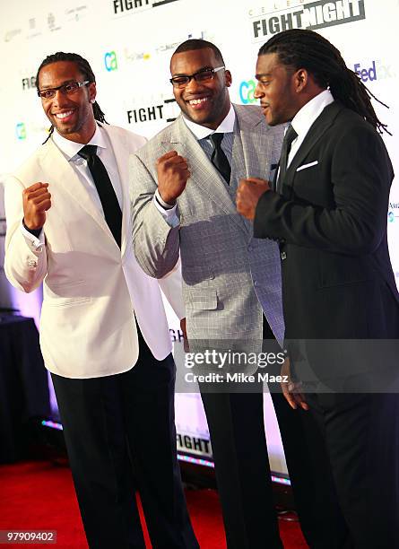 Players Larry Fitzgerald, Beanie Wells, and Tim Hightower attend Celebrity Fight Night XVI on March 20, 2010 at the JW Marriott Desert Ridge in...