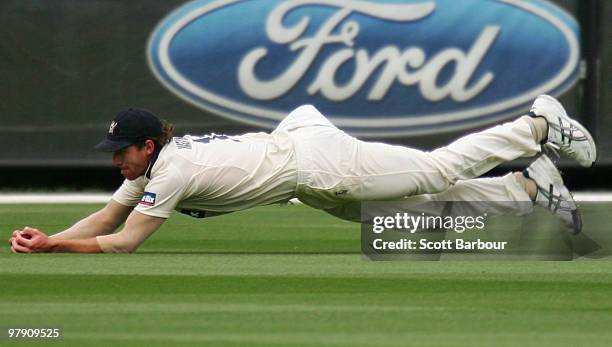 John Hastings of the Bushrangers takes a diving catch in the outfiled to dismiss Ben Cutting of the Bulls during day five of the Sheffield Shield...
