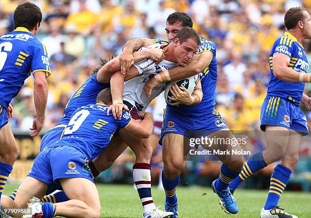Anthony Watmough of the Eagles is tackled during the round two NRL match between the Parramatta Eels and the Manly Sea Eagles at Parramatta Stadium...