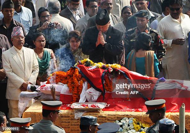 Nepal's Chairman of the Constituent Assembly Subhas Newang pays his last respects to former prime minister and Nepali Congress party president Girija...