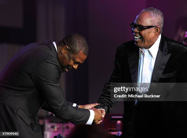 Actor/comedian Chris Tucker and singer Sam Moore onstage during Celebrity Fight Night XVI on March 20, 2010 at the JW Marriott Desert Ridge in...