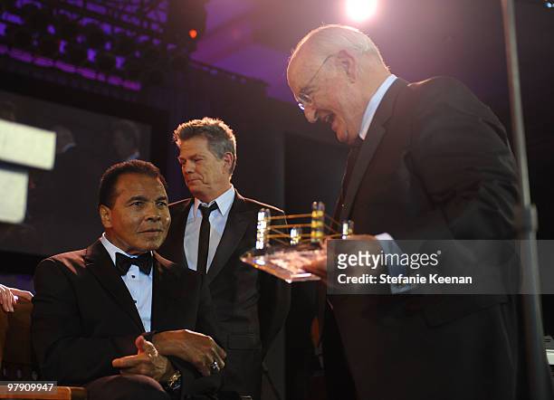 Muhammad Ali, producer/musician David Foster, and Walter Scott Jr onstage during Celebrity Fight Night XVI on March 20, 2010 at the JW Marriott...