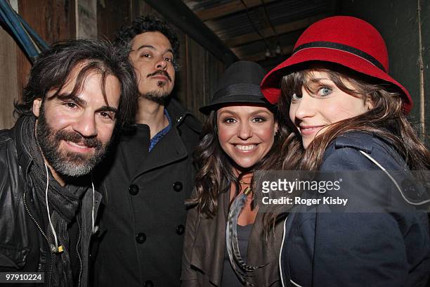 John Cusimano, M. Ward, Rachael Ray and Zooey Deschanel pose for a portrait backstage after the performance of She & Him at the Rachael Ray Party at...