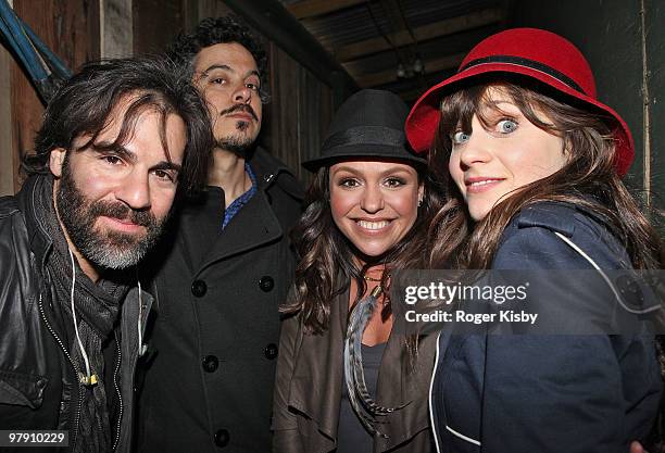 John Cusimano, M. Ward, Rachael Ray and Zooey Deschanel pose for a portrait backstage after the performance of She & Him at the Rachael Ray Party at...