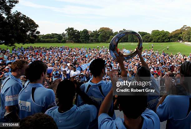 Sydney Players hold the trophy up to the crowd during the Sydney FC A-League Grand Final celebrations at The Domain on March 21, 2010 in Sydney,...