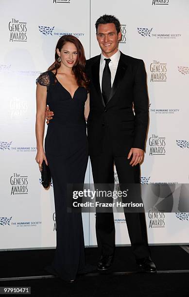 Actress Amanda Righetti and Owain Yeoman pose in the press room at the 24th Genesis Awards held at the Beverly Hilton Hotel on March 20, 2010 in...