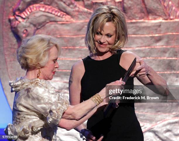 Actress Melanie Griffith presents her mother, Tippi Hedren with the Genesis Lifetime Achievement Award during the 24th Genesis Awards at the Beverly...