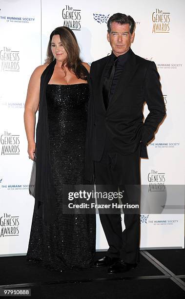 Actor Pierce Brosnan and Keely Shay Smith pose in the press room at the 24th Genesis Awards held at the Beverly Hilton Hotel on March 20, 2010 in...