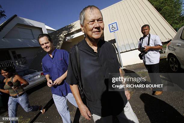 French outgoing President of La Reunion regional council , communist Paul Verges, head of the left-wing parties list, leaves the polling station...