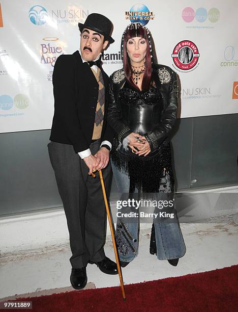 Charlie Chaplin impersonator and Cher impersonator Lissa Negrin attend "Celebrate 5 Decades Of Music" Benefit For The Homeless For "Out 2 Connect"...