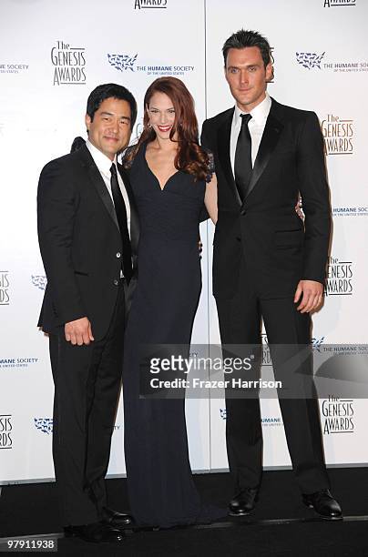 Actors Tim krang Amanda Righetti and Owain Yeoman pose in the press Room at the 24th Genesis Awards held at the Beverly Hilton Hotel on March 20,...