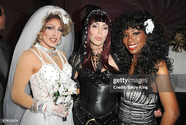 Madonna impersonator, Cher impersonator Lissa Negrin and Donna Summer impersonator attend "Celebrate 5 Decades Of Music" Benefit For The Homeless For...