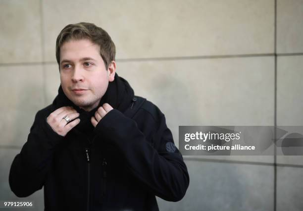 March 2018, Germany, Berlin: The leader of the 'Jusos', the youth organisation of the Social Democratic Party's , Kevin Kuehnert, reacts after the...