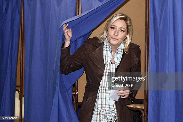 Vice-president of the far-right National Front of Jean-Marie Le Pen, Marine Le Pen, exits a polling booth on March 21, 2010 at Hénin-Beaumont, for...
