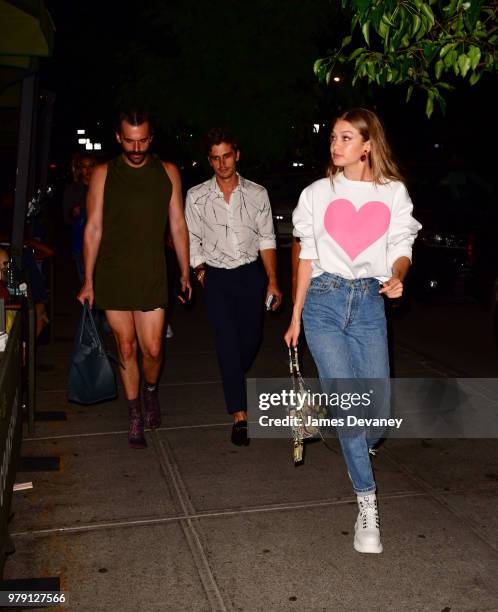 Jonathan Van Ness, Antoni Porowski and Gigi Hadid arrive to Cookshop on June 19, 2018 in New York City.