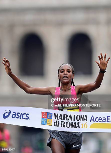 Ethiopian Firehiwot Dado Tufa crosses the finish line after winning the 16th Rome Marathon 'Maratona di Roma' on March 21, 2010. AFP PHOTO / Filippo...