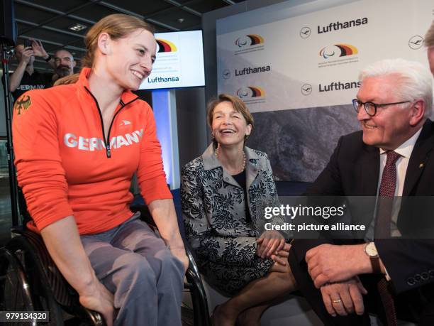 March 2018, Germany, Frankfurt am Main: Anna Schaffelhuber , monoski, has a conversation with Elke Buedenbender, wife of the German President and...