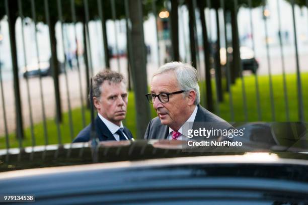 President of the European Commission Jean-Claude Juncker gets into his car after giving a statement to the press after a meeting of the European...