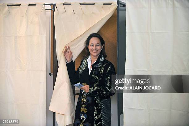 French socialist outgoing president of the regional council of Poitou-Charentes and candidate to her own succession, Segolene Royal, leaves a polling...
