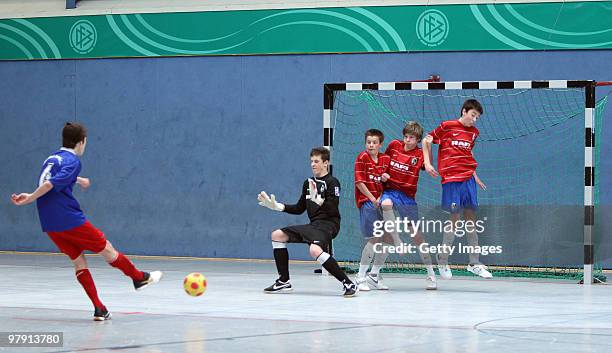 Julian Weigl of TSV 1860 Rosenheim and Rafael Rammo, Noel Stolp, Felix Widmann and Mario Kaltenmark of SC Freiburg in action during the DFB c-junior...