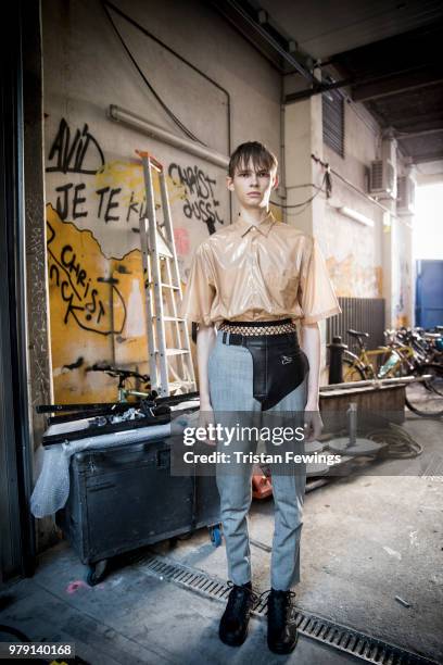 Model poses backstage prior the CMMN SWDN Menswear Spring Summer 2019 show as part of Paris Fashion Week on June 19, 2018 in Paris, France.