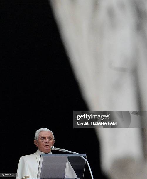 Pope Benedict XVI celebrates his Sunday Angelus prayer from the window of his apartment on St. Peter's square at the Vatican on March 21, 2010. AFP...