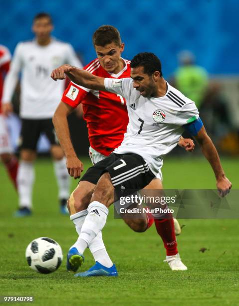 Ahmed Fathi of the Egypt national football team vie for the ball during the 2018 FIFA World Cup match, first stage - Group A between Russia and Egypt...