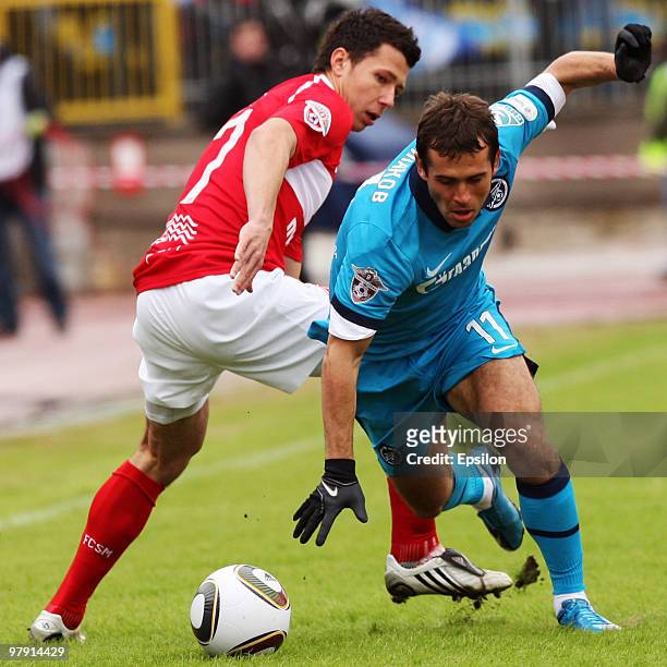 Aleksandr Kerzhakov of FC Zenit St. Petersburg takes the ball past Marek Suchy of FC Spartak, Moscow during the Russian Football League Championship...
